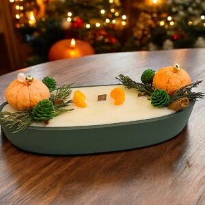 велика різдвяна свічка з мандаринами та трьома дерев’яними ґнотами